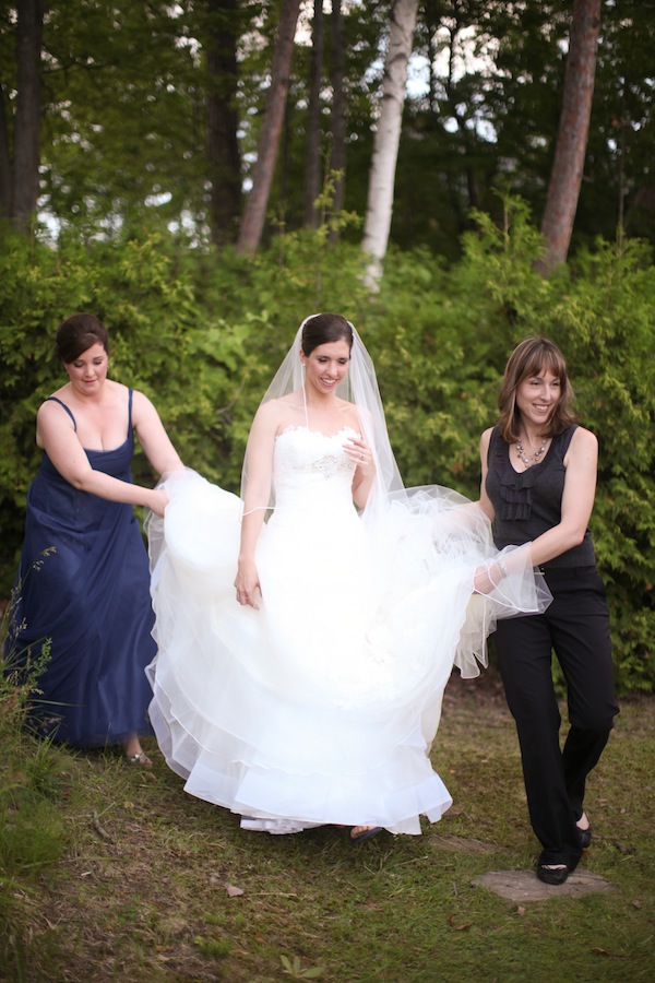 Planner Shannon Whitney helping a bride to her ceremony